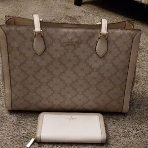 Practically new, authentic kate spade hand bag with matching wallet